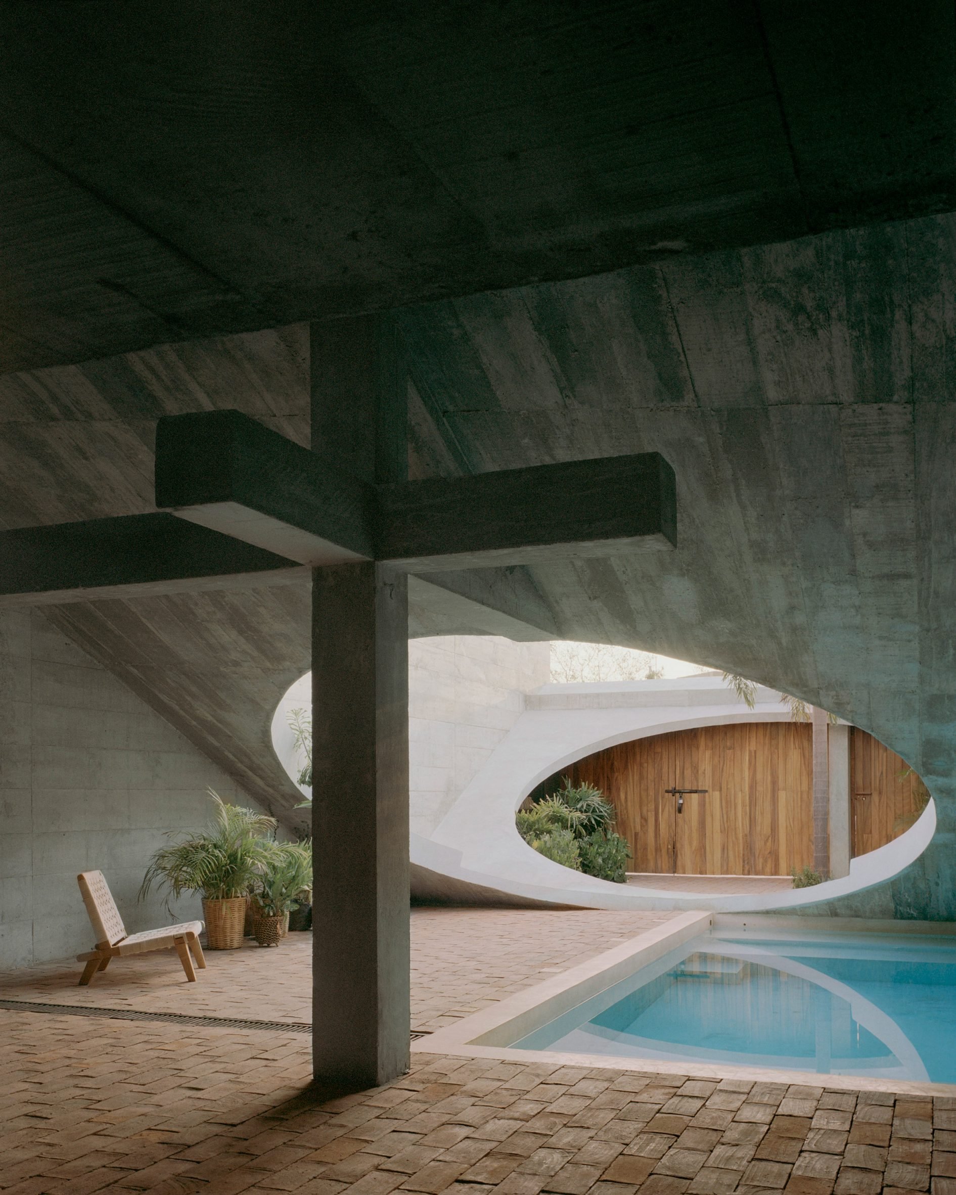 The interior of a home with a large circular skylight at the centre