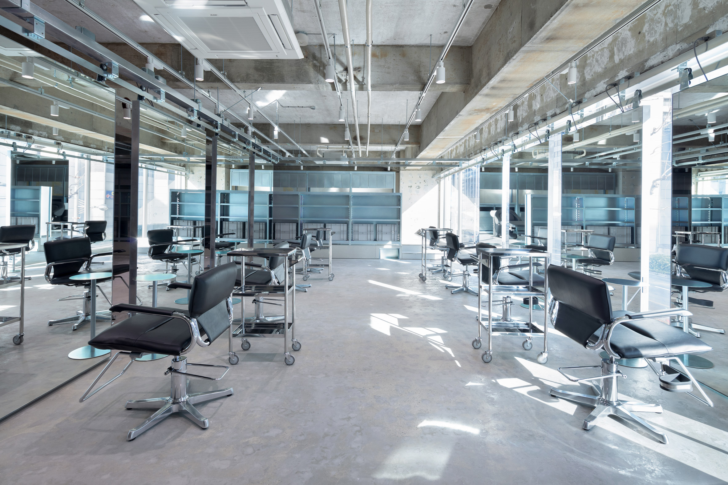 LIM and Loji hair salons by Schemata Architects