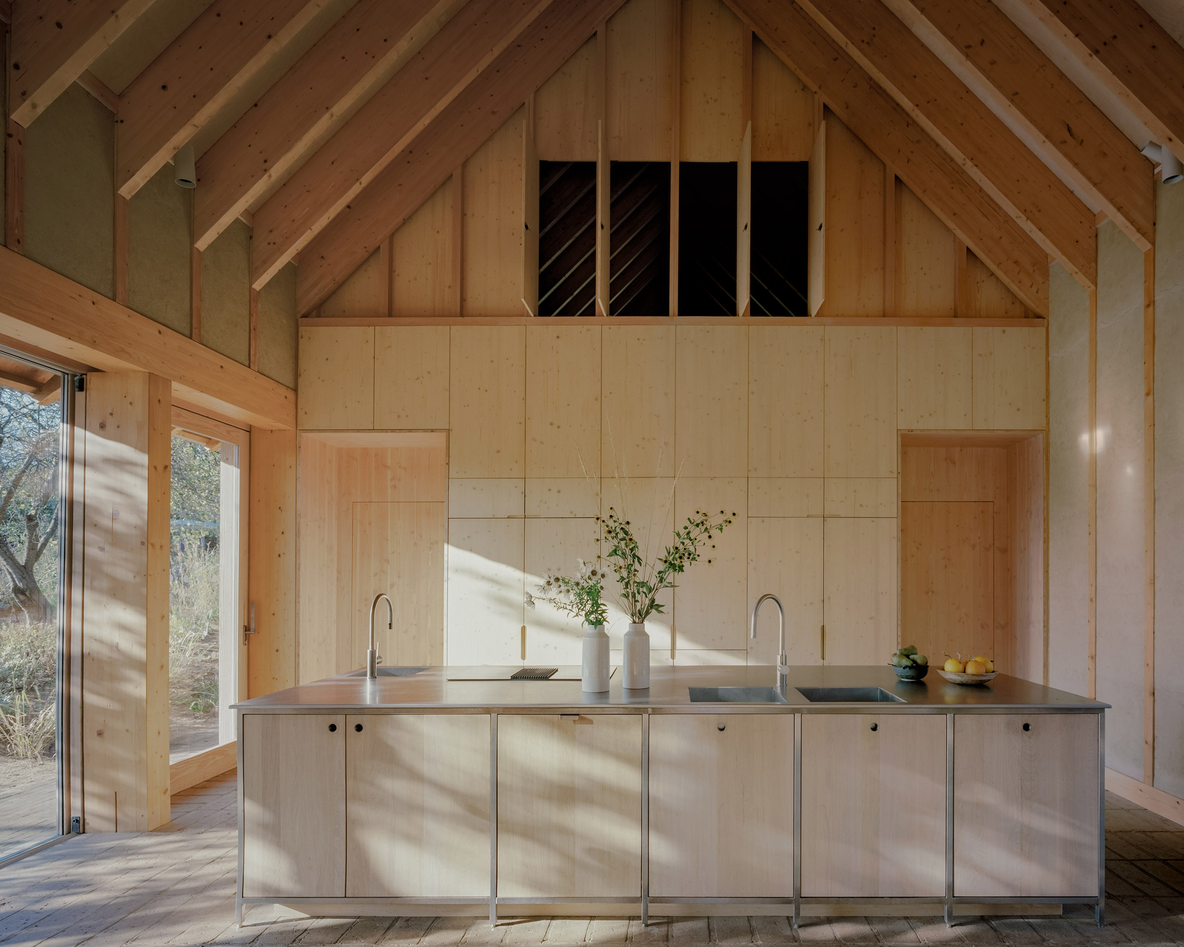 Kitchen interior at education centre by Okra